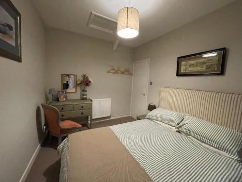 Ένα ή περισσότερα κρεβάτια σε δωμάτιο στο 3 Stable Mews