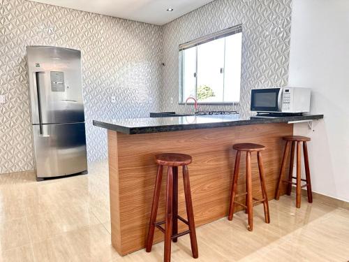 Køkken eller tekøkken på Casa Aconchegante em Hortolândia