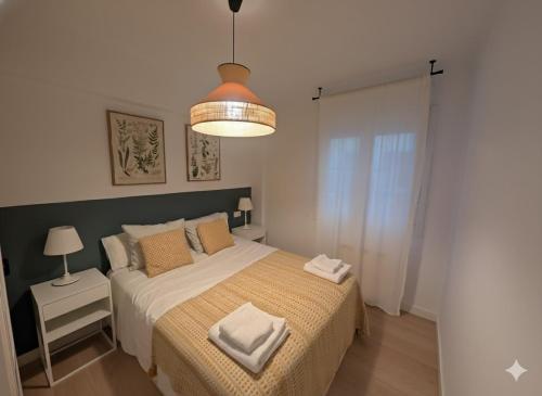 Postel nebo postele na pokoji v ubytování Apartamento enbata