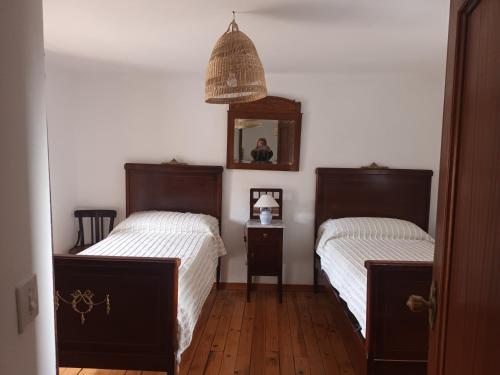 En eller flere senge i et værelse på La Botica del Lobo