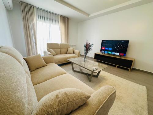 Et tv og/eller underholdning på Joli f3 a Gambetta - king bed - fast internet - 100m2