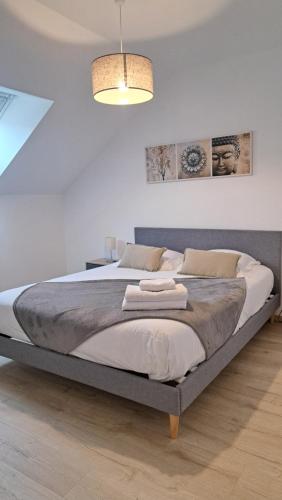 En eller flere senge i et værelse på Maison tout confort proche Azay-le-Rideau 8 p