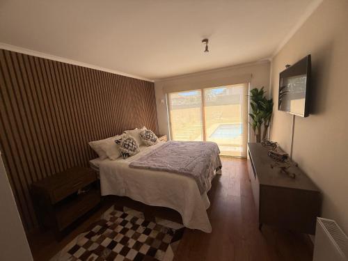 Postel nebo postele na pokoji v ubytování Apart Hotel Chillán - Platinum house - Parking - Wifi - Factura