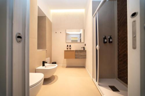 Et badeværelse på Donna Isabella - Boutique Rooms