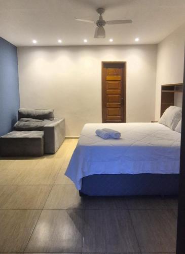 Postel nebo postele na pokoji v ubytování Aconchego III