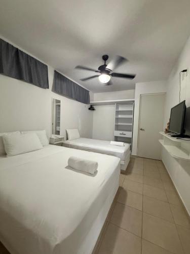 Postel nebo postele na pokoji v ubytování Casa Azul Mahahual