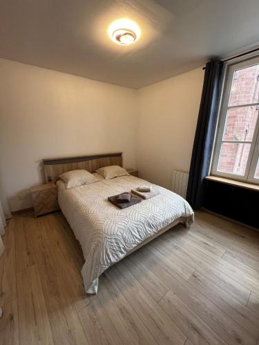 Postel nebo postele na pokoji v ubytování Appartement Le Signature