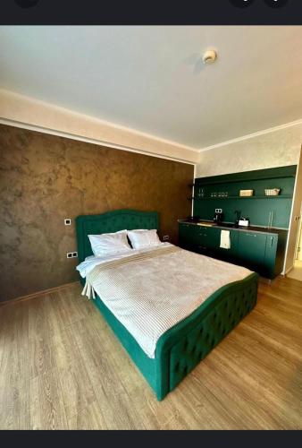 En eller flere senge i et værelse på Studio Ivana 2 by Blaxy Residence