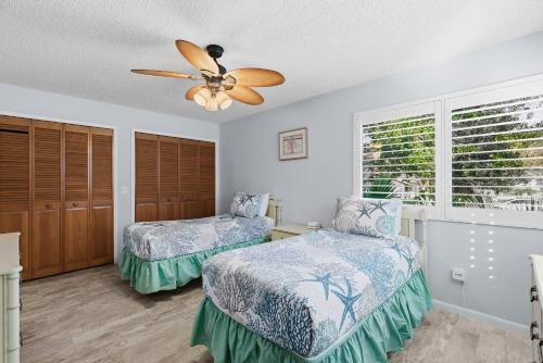 Ένα ή περισσότερα κρεβάτια σε δωμάτιο στο Sea Woods Villa 4350