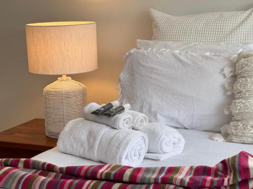 En eller flere senge i et værelse på Palacete Beach Resort