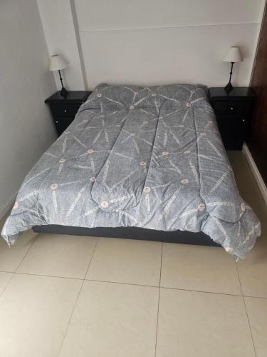 Ένα ή περισσότερα κρεβάτια σε δωμάτιο στο Depto San Martín VCP