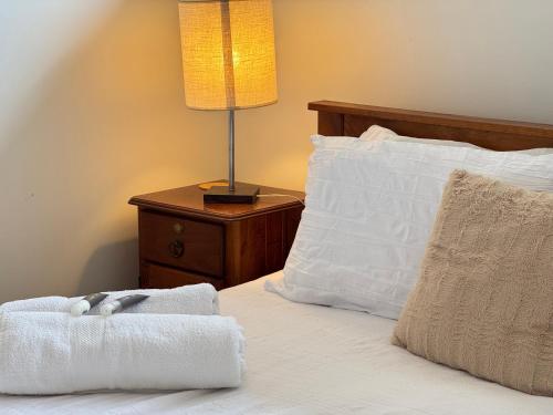 Ένα ή περισσότερα κρεβάτια σε δωμάτιο στο Palacete Beach Resort