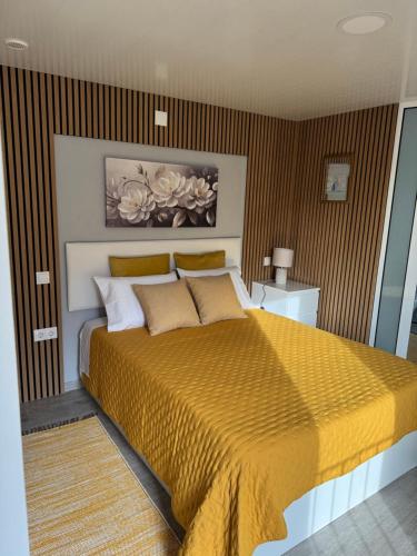 Giường trong phòng chung tại O Refúgio