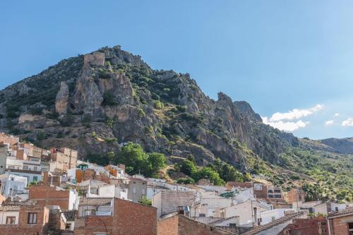 a view of a city with a mountain at Pico Mágina in Albanchez de Magina