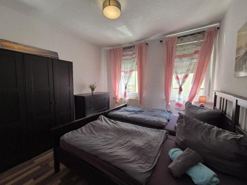 Postel nebo postele na pokoji v ubytování Mikra Homes24 in Meerane