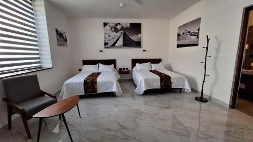 Una cama o camas en una habitación de Hotel Casa Vivaldi