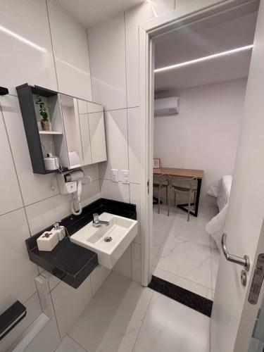 Kuchyň nebo kuchyňský kout v ubytování Quarto master Fortaleza Sul