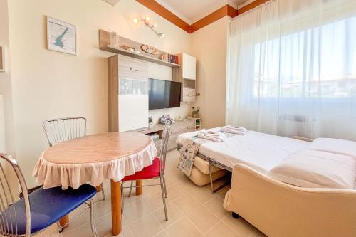 a hospital room with a bed and a table at Riva chiara in Toscolano Maderno