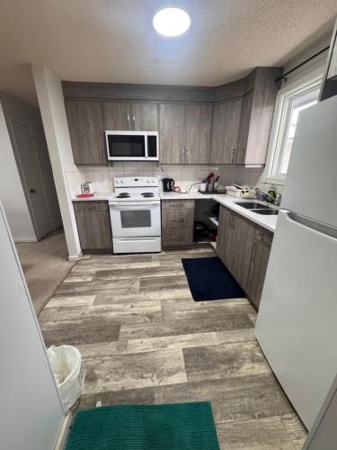 Kuchyň nebo kuchyňský kout v ubytování Calgary Home