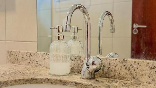 Et badeværelse på Aconchegante Casa em Ipioca Jeunne Ville