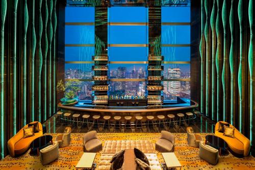 a room with a view of a city at The Prince Gallery Tokyo Kioicho, a Luxury Collection Hotel in Tokyo