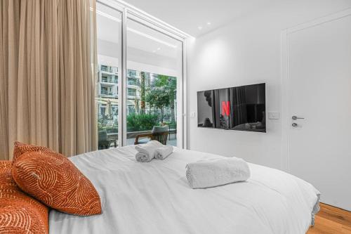 Postel nebo postele na pokoji v ubytování Beautiful garden suite