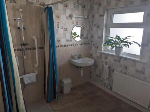 Koupelna v ubytování Dunloe View