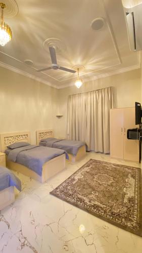 Postel nebo postele na pokoji v ubytování استراحة الساحل الشرقي صور