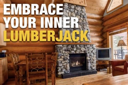 an image of a living room with a fireplace at Charming Rustic Cabin Perfect for Groups in Golden