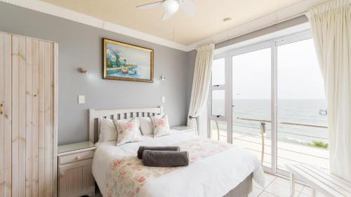 Кровать или кровати в номере The Sunset Villas