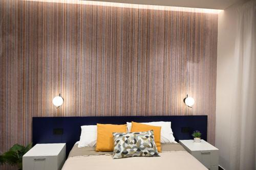 Кровать или кровати в номере Le Due Muse b&b