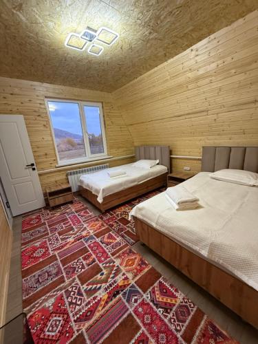 Ένα ή περισσότερα κρεβάτια σε δωμάτιο στο Alban