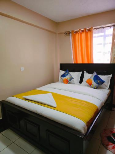 Ένα ή περισσότερα κρεβάτια σε δωμάτιο στο Vee place Bridgeview furnished apartment