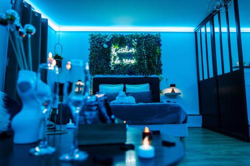 Ένα ή περισσότερα κρεβάτια σε δωμάτιο στο L'Atelier de rêves