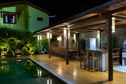 Swimmingpoolen hos eller tæt på Villa Piquiá, piscina, área gourmet, jacuzzi