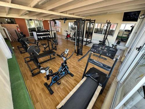 an overhead view of a gym with exercise equipment at Apart Sorrento in Santa Teresita