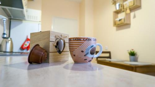 Kuchyň nebo kuchyňský kout v ubytování Bella Apartment