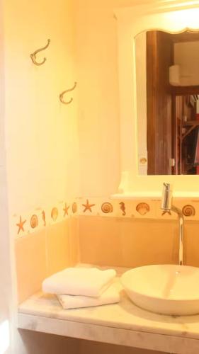 Koupelna v ubytování Pousada Regina Guest House - Chalé 1