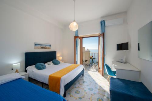 Postel nebo postele na pokoji v ubytování Hotel Villa Bellavista