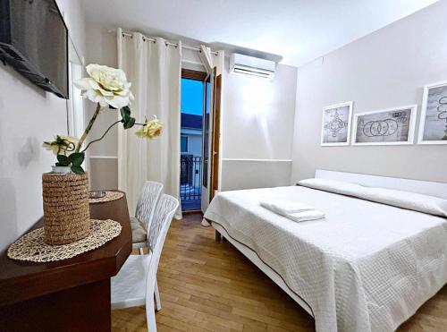 Ένα ή περισσότερα κρεβάτια σε δωμάτιο στο La Dimoraga