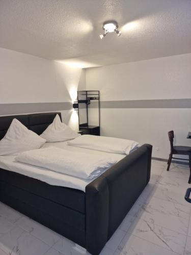 Postel nebo postele na pokoji v ubytování La Fontana