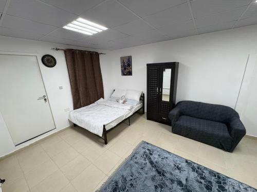 Postel nebo postele na pokoji v ubytování Sea Side Studio