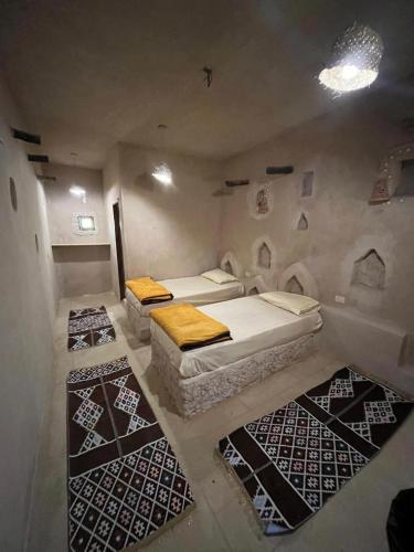 Postel nebo postele na pokoji v ubytování Santarya Siwa hotel