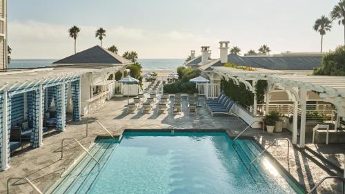 a view of the pool at a resort with a beach at Shutters On The Beach in Los Angeles