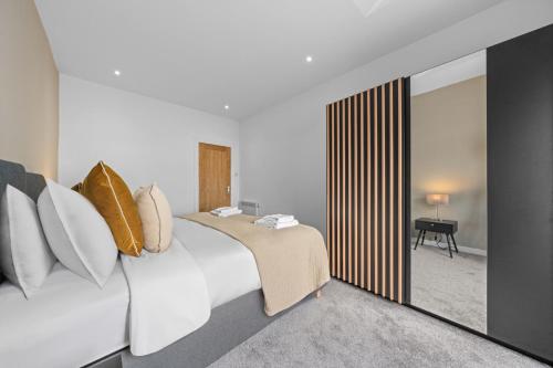 Postel nebo postele na pokoji v ubytování Beachwalk Apartments by Nova Suites