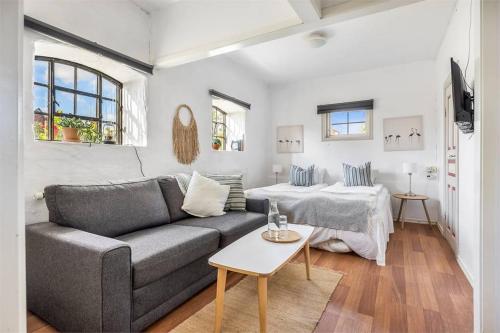 Posezení v ubytování Eksgården Gårdshotell