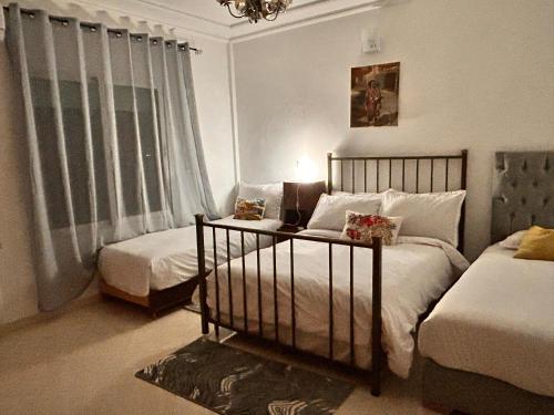 Ένα ή περισσότερα κρεβάτια σε δωμάτιο στο Dare Ania