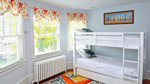 Postel nebo postele na pokoji v ubytování Cape May Classic