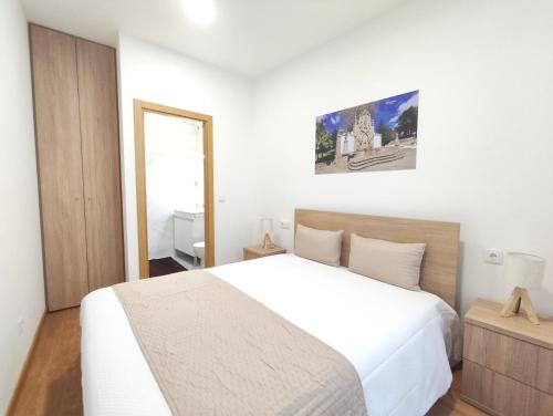 En eller flere senge i et værelse på Misericórdia Rooms