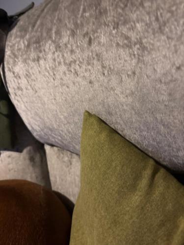 a close up of a piece of cloth and a pillow at Nice flat tv and WiFi town centre in Hull